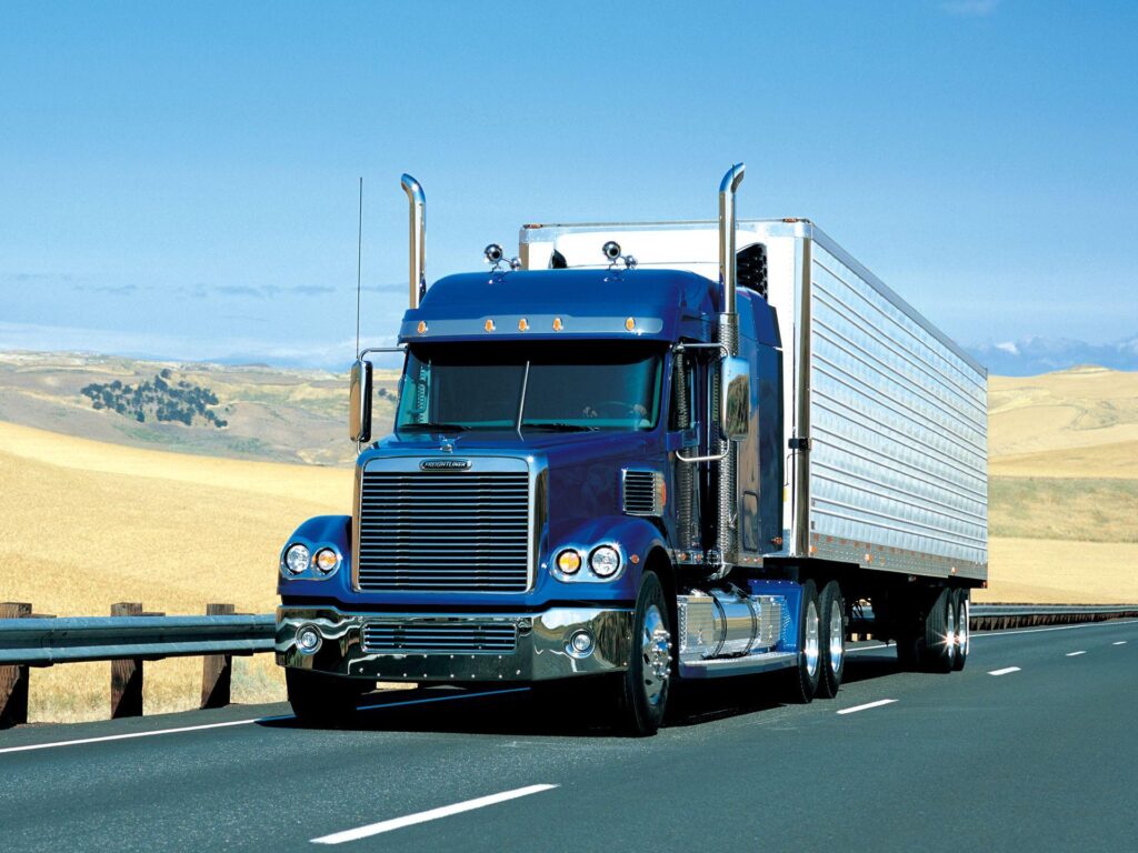 blue and white truck on GT road